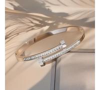 Bracelet en acier doré avec charnière élastique réglable et rangée complète de cristaux de zircone pour un style minimaliste raffiné (2)