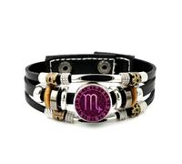 Bracelet En Cuir Tressé Ajustable Fault Art, Orné D'Une Boussole Scorpion Et D'Un Symbole De Chance. Inspiré Des Créations Ethniques, Ce Bracelet Fait Main Est Un Accessoire D'Amitié Idéal Pour