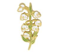 Broche distinctive en forme de tête de mort et de muguet, pour les amateurs d'art et les fans de punk, à la recherche de pièces uniques et punk