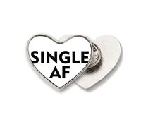 Broche en métal en forme de cœur avec insatisfaction émotionnelle