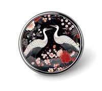 Broche ronde représentant une grue et un héron, ornée d'un oiseau en vol. Accessoire de mode personnalisé, idéale comme bijou ou cadeau de mariage.