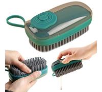 Brosse de nettoyage avec une dose de savon