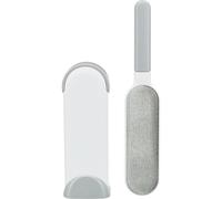 Brosse de nettoyage de peluches pour animaux.