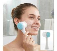 Brosse nettoyante double face pour le visage - Bleu doux | Brosse manuelle double face pour le visage avec poils doux et coussinet en silicone sur la poignée verticale.