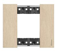 Living now, plaque montée sur la partie fonctionnelle de linterrupteur, tout comme les touches, pour lui apporter une finition esthétique