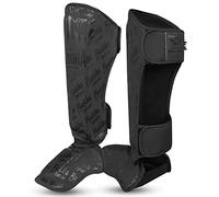 BUDDHA FIGHT WEAR - Protège-tibias Muay Thai, MMA et Kick Boxing Modèle Epic - Fabriqué en Cuir Synthétique Dernière Génération - Coutures plus résistantes et renforcées - Couleur Noir Mat - Taille XL