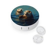 BVKWNTSA L'étui rond portable pour lentilles de contact imprimé loutres de mer est élégant et compact, facile à transporter et protège les lentilles.