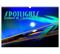 Calendrier 2027 · US Version · COUP DE PROJECTEUR - Les guitares à | l'honneur · Reflets surréalistes des lumières de la scène · DIN A3 paysage · CALVENDO Calendrier mural