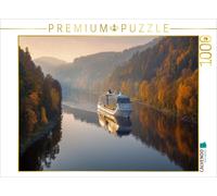 CALVENDO Puzzle A cruise ship sails through an autumnal river landscape | 1000 p