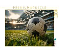 CALVENDO Puzzle A soccer lies on the green pitch of a full stadium, heralding th