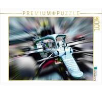 Puzzle · L'Allemand Sebastian Vettel, Quadruple Champion du Monde, a Fait | ses débuts en 2021 au sein de l'écurie britannique Aston Martin · 1000 pièces · Format assemblé 64 × 48 cm · CALVENDO Puzzle