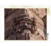 CALVENDO Puzzle One of four snarling sandstone head masks with snakes | 1000 pie