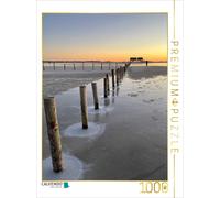 CALVENDO Puzzle Round ice formations surround a row of piles on Ordingen beach |