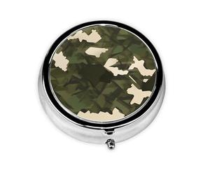 Camouflage militaire. Cette petite boîte à pilules ronde imprimée est un organisateur portable de pilules et de vitamines, parfait pour les poches, les sacs à main et les voyages.