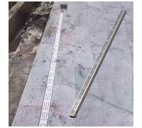 Canal de drainage avec grille, système de gouttière mince pour une gestion efficace de l'eau dans la cour, la terrasse, les allées et le garage