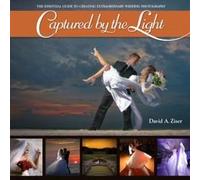 Captured by the Light: The Essential Guide to Creating Extraordinary Wedding Photography [Paperback]