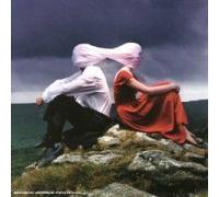 Casually Dressed & Deep In Conversation