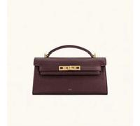 Ce nouveau sac à main de luxe léger lancé en 2025 présente un design bicolore marron et blanc, combinant le et des motifs tissés pour rehausser le toucher. La quincaillerie métallique vintage et les b
