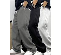 Ce pantalon de jogging casual pour hommes présente une coupe ample et droite avec une doublure thermique pour le confort et le tombé. Convenant aussi bien pour le port en intérieur qu'en extérieur, il