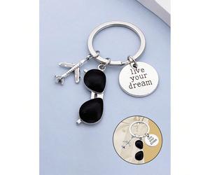 Ce porte-clés a pour thème principal la citation du pilote "Vis ton rêve", décoré de motifs d'avion et de lunettes de soleil de voyage. Fabriqué en alliage de zinc avec un design sportif, c'est un acc