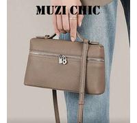 Ce sac à main minimaliste avec motif de litchi comporte une fermeture éclair en métal et une bandoulière réglable pour s'adapter à différents styles de port. Il convient aussi bien pour les trajets qu