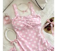 Ce Top court ajusté et décontracté dans un style de conte de fées Y2K pour femmes présente des pois et un joli nœud. C'est un look doux et innocent, parfait comme cadeau pour une amie ou pour un port 