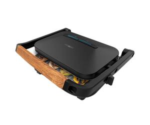 Cecotec Gril électrique Rock'NGrill 1300 Wood B. Puissance de 1300 W, design noir, revêtement Rockstone, base antidérapante, plaque flottante, témoin lumineux, poignée en bois, grande polyvalence.