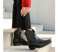 Ces bottes de crocodile allient élégance et sophistication La texture du crocodile est sophistication et sophistication. La texture est unique, la texture est unique, la ressemblance avec le crocodile