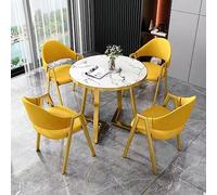 Cet Ensemble Table et chaises Rondes de Style Moderne du Milieu du siècle, avec Ses Pieds en métal doré et Ses chaises rembourrées, est idéal pour optimiser l'espace dans Un Salon, Une Salle
