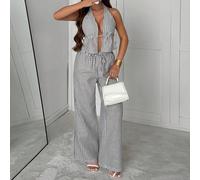 Cette nouvelle collection printemps/été présente un Top à col ras-du-cou élégant et rétro avec une texture de lin rayé, ainsi qu'un pantalon ample de couleur café. Ce look est décontracté, relaxé et s