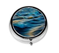 Cette petite boîte à pilules ronde Dawn Ocean Waves est un organisateur de médicaments de voyage portable avec trois compartiments pour ranger les médicaments quotidiens.