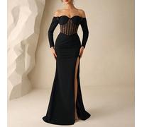 Cette robe élégante de style sirène pour l'automne/l'hiver présente un design transparent orné de strass avec des épaules dénudées, le dos nu, des manches longues et une fente haute. Parfaite pour les