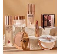 Charlotte Tilbury Fond de Teint Liquide, Fond de Teint en Coussin, Spray Fixateur, Poudre Compacte, Fard à Joues en Poudre 2 Couleurs, Fard à Paupières, Rouge à Lèvres
