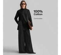 Chemise minimaliste pour femmes à col montant, manches longues, style cache-cœur, couleur unie noire. Tenue décontractée mais professionnelle, idéale pour le bureau, l'enseignement. Nouvelle collectio