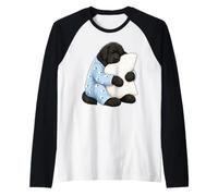 Chien Terre-Neuve endormi dans Un Pyjama Mignon Manche Raglan