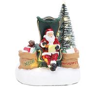 Christmas Concepts® 16cm (6.4") Père Noël lisant des Lettres Coquines et gentilles avec des lumières LED Blanches Chaudes - à Piles - Village de Noël