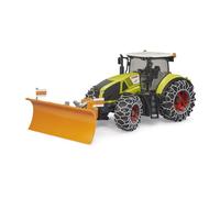 Claas Axion 950 avec chaînes à neige et lame de niveleuse