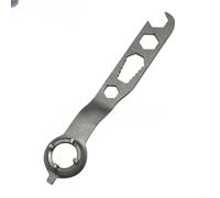 Clé à quatre griffes pour disques de meuleuse d'angle offrant un engagement stable pendant les étapes de réglage manuel