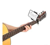 Clip pour smartphone pour guitare qui permet une intégration pratique des outils numériques dans le flux de travail d'apprentissage de la musique traditionnelle