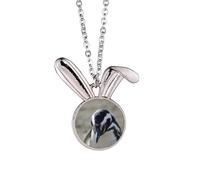Collier avec pendentif en forme de pingouins et image de la nature