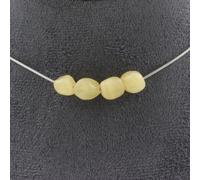 Collier composé de 4 perles de calcite jaune du Royaume-Uni. Collier en acier inoxydable