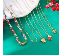 Collier superposé avec pendentifs Père Noël, flocon de neige et sapin de Noël pour une tenue saisonnière et décontractée (E)