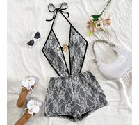 Combinaison de vacances en dentelle blanche et noire avec décolleté en V profond, dos lacé et découpe taille basse L,M,S,XL,XSTout ImpriméDentelle