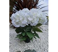 Composition artificielles, lesté Ciment. Réalisé par nos Soins,. Les Fleurs sont de Bonne qualité. Vous ne serez Pas déçus par sa résistance au Vent.