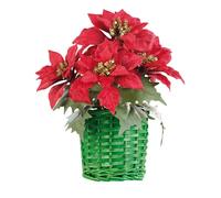Composition florale de Noël avec poinsettias et panier tissé