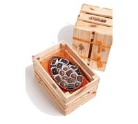 Coquille de chocolat croustillante avec pralines, coupes et œufs dans un coffret en bois (700 g)