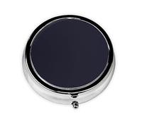 Couleur unie noire. Cette petite boîte à pilules ronde est un organisateur de médicaments de voyage portable avec trois compartiments pour stocker des médicaments quotidiens.