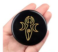 Cristaux ronds d'obsidienne noire avec pierres sculptées en forme de soleil, étoile et lune