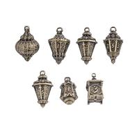 Cusdie Lot de 7 dés DND lanterne avec sac à dés en forme de tête de mort, parfait pour les RPG de table, les jeux de société, les cadeaux et les collections (bronze)