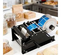 CUTANGELAR L'étiqueteuse Manuelle pour Bouteilles Rondes Atteint Une Cad-ence De 30 Étiquettes par Minute, Sa Robustesse Lui Permet Une Utilisation Quotidienne en Production Et en Logistique.